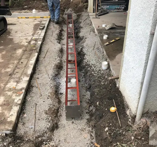 The Benefits of Pre-Sloped Trench Drains Over Traditional Drainage