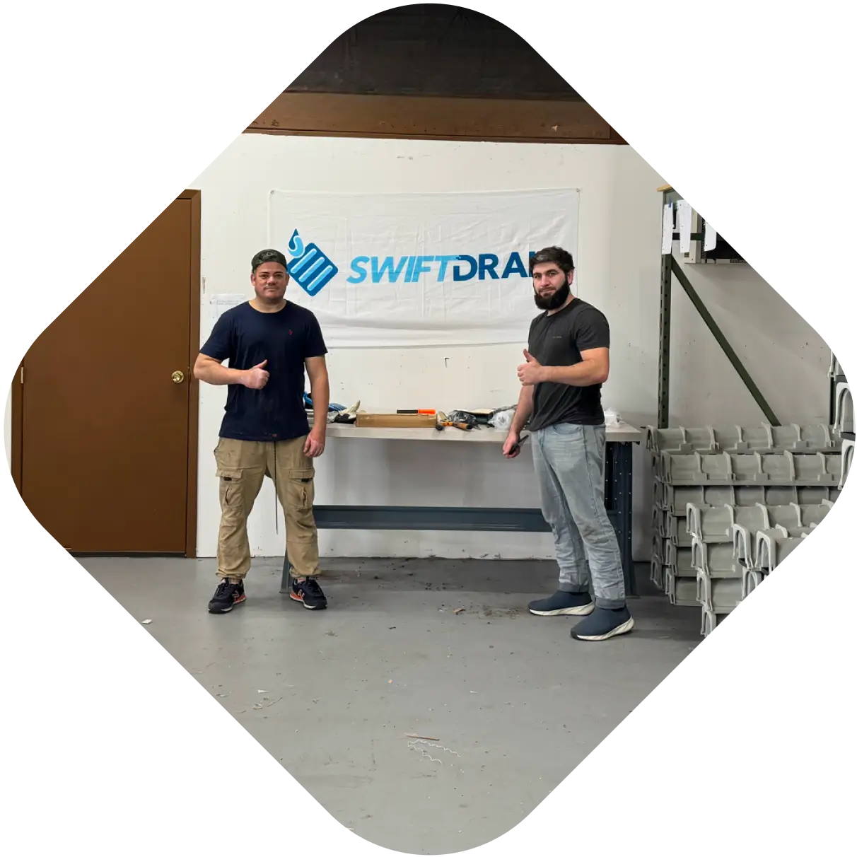 SwiftDrain Workers In A Warehouse