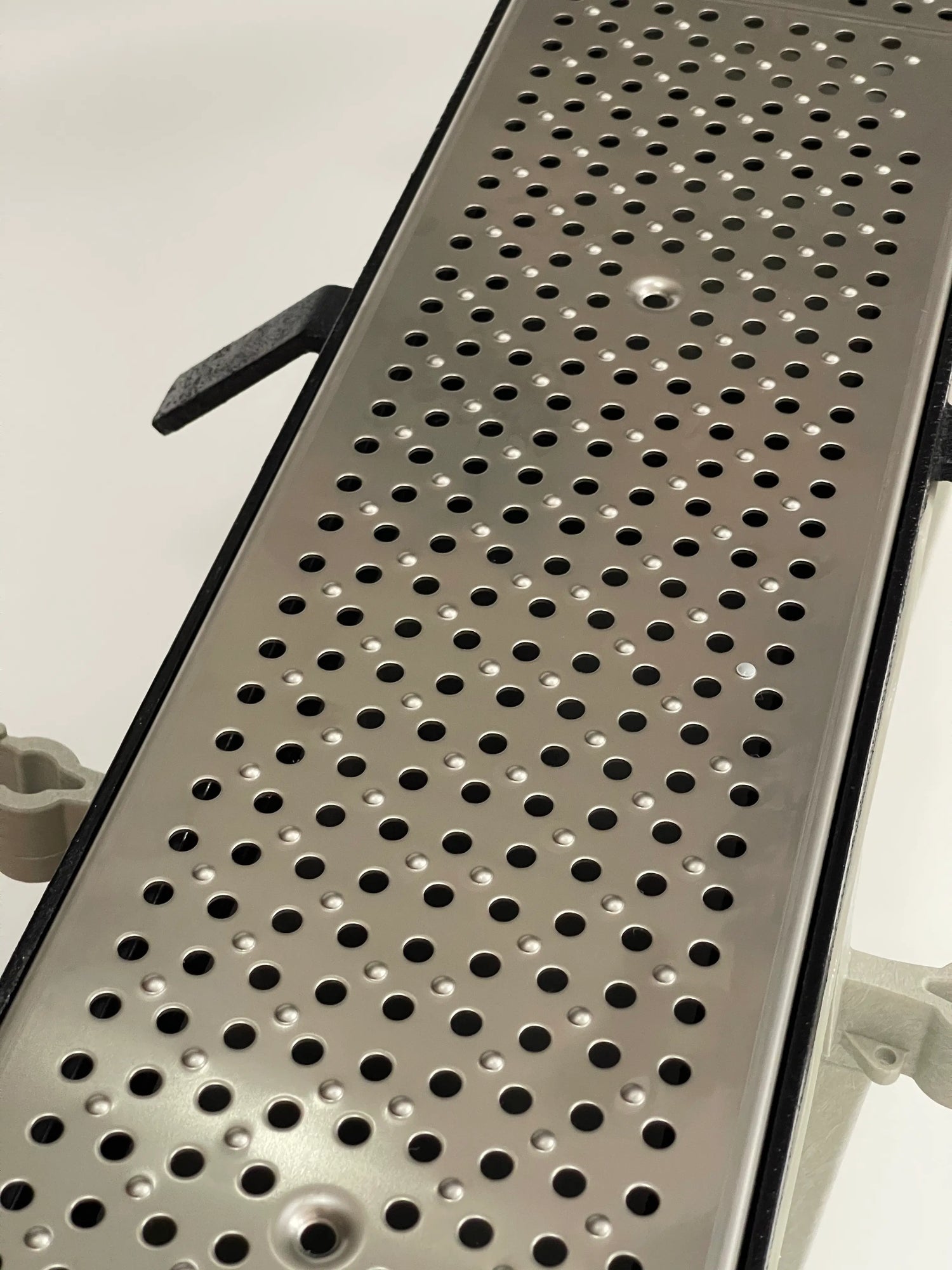 Chemical processing facility stainless steel grates