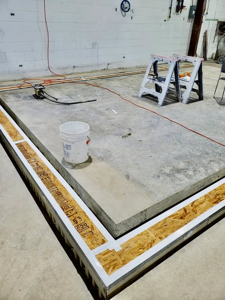 Manufacturing facility perimeter drain drainage